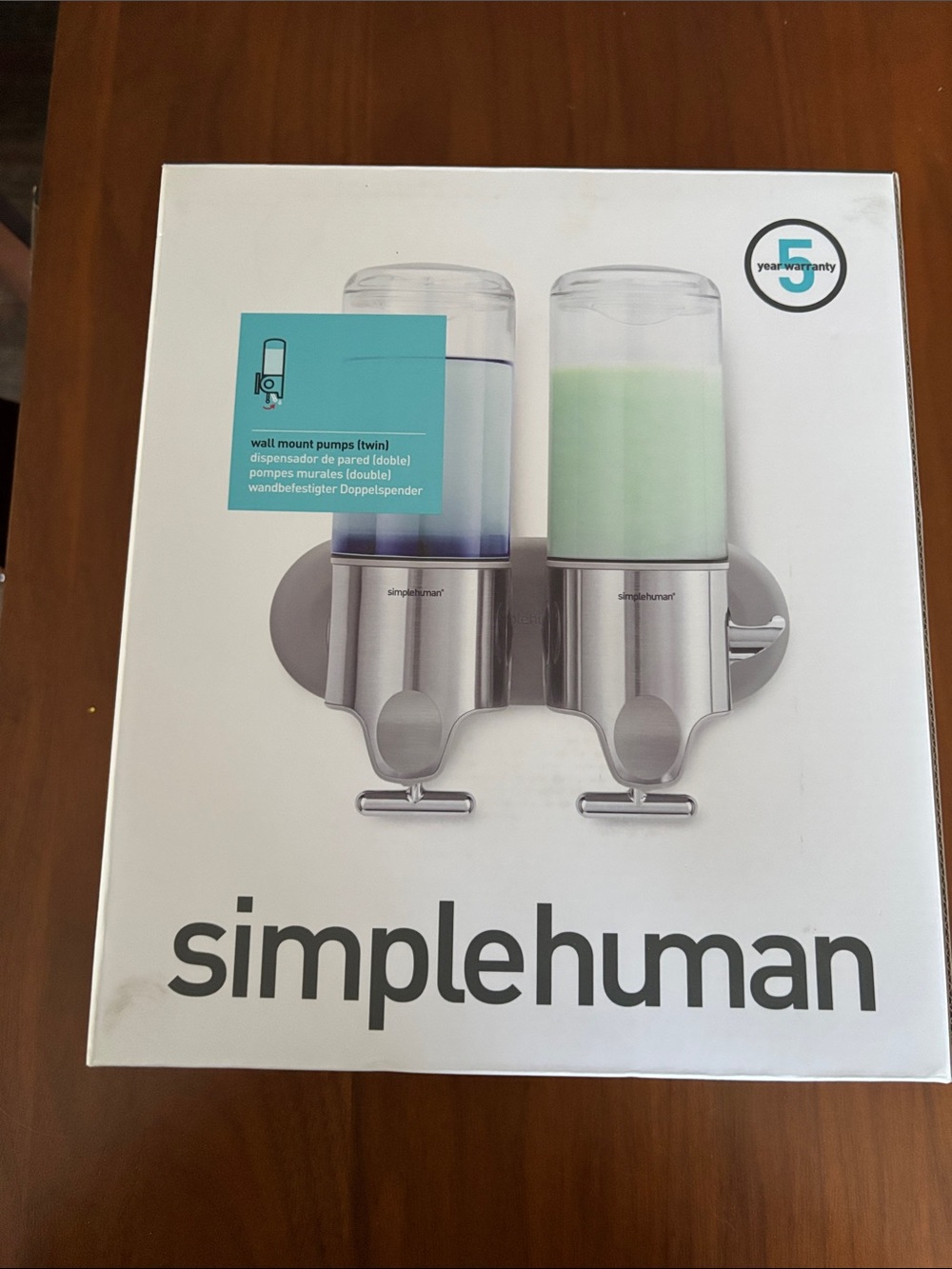 Simple Human Twin Shampoo and Conditioner dispenser.
